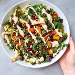 Roasted vegetable and kale salad with creamy tahini dressing